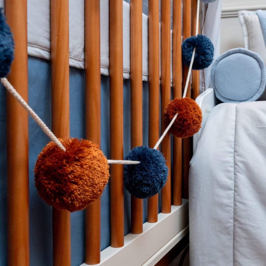 Penduricalho de Berço de Pompons World