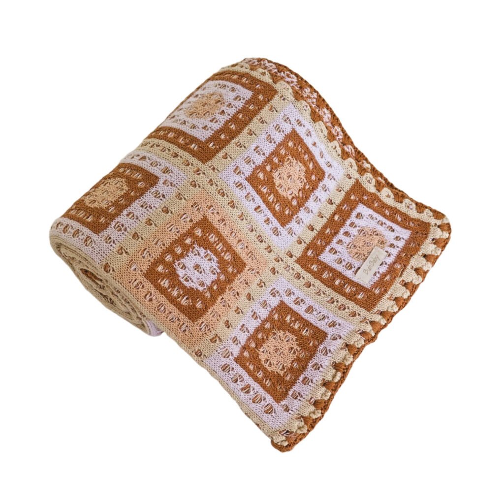 Manta em Tricot Geo Cobre